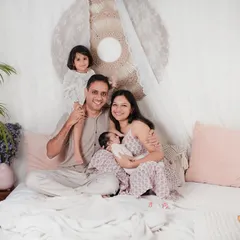 A perfect family portrait, filled with so much love and happiness. Capturing the bond between parents, siblings, and the newest little one is what makes these family newborn sessions so special.