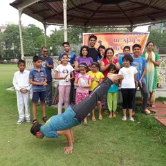 A proud moment demonstrating Mayurasana (Peacock Pose) surrounded by our wonderful students of all ages. This is what our community is all about: learning, growing, and smiling together.
