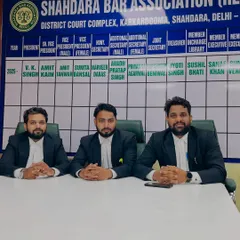 The team seated in the Shahdara Bar Association office. We work together closely on drafting legal documents and strategizing for cases.