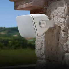 The Bowers & Wilkins AM-1 is an architectural monitor that is as tough as it is elegant. Mounted on a rustic stone wall, its clean design complements the architecture while its weather-resistant build ensures year-round high-quality audio for any outdoor area.