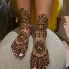 Another view of the elephant foot mehandi, showing the beautiful symmetry and the detailed work on the toes.