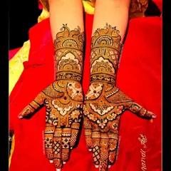 A vibrant and culturally rich design, this full-hand mehndi showcases the beauty of traditional Indian patterns.