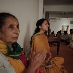Devotees of all ages, from the young to the elderly, participate in our Guru Purnima chants. Their faces reflect a deep sense of involvement and love.