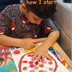 A young artist begins his pizza drawing, carefully outlining the toppings and crust. Our method breaks down complex images into simple, manageable steps.