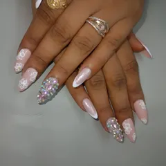 Another angle of the rhinestone and 3D flower bridal set, showing how it catches the light. These are designed to be the ultimate accessory for your special day.