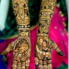 A truly personalized bridal design featuring a portrait of the bride on one palm and the couple on the other. On the arms, I've included a figure of Shrinathji and other custom elements that were special to her.