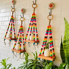 Looking to create a 'Pinterest-worthy' wall? Our colorful beaded wall shelves are just the thing. Made with vibrant wooden beads, jute twine, and a natural wood shelf, they bring so much life and color to any space, especially balconies and garden areas.