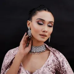 This soft glam look with a subtle brown smokey eye and nude lips is perfect for elegant evening events. I teach versatility, from bold statements to understated sophistication.