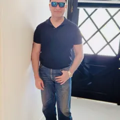 Dressed for a meeting in the US. My practice is international, and I am comfortable and effective whether I am in a courtroom in Delhi or a boardroom in America.