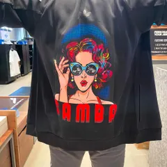 A custom pop-art hoodie we created during our Adidas Samba event. This piece features a retro-style portrait with vibrant colors, printed on the back of a black Adidas hoodie.