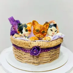 A basket full of cuteness, this cake features three entirely edible, hand-molded kittens. I loved creating this piece for a mom to surprise her cat-loving daughter.