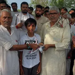 Another proud moment from the 'Jaidpura Run', awarding a prize to a promising young athlete. Supporting grassroots sports is essential for building future champions.
