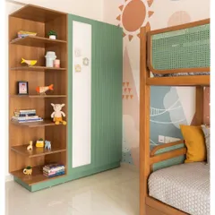 The room also features a custom wardrobe with a magnetic white panel for drawings and notes, next to an open bookshelf for toys and stories.