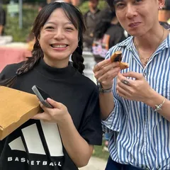 Happy faces at the Adidas corporate event. It's always great to see employees enjoying a fresh slice of pizza as a reward for their hard work.