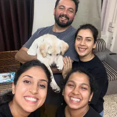 A happy family portrait with their new Labrador puppy after a successful training session. My team and I love being part of a family's journey with their new dog.