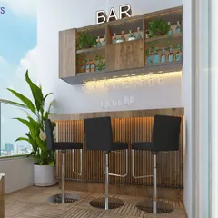 A stylish balcony bar from our 'Modern Fusion' project in Pune. This space is perfect for enjoying a drink while taking in the city view, with a wooden bar, comfortable stools, and integrated lighting.
