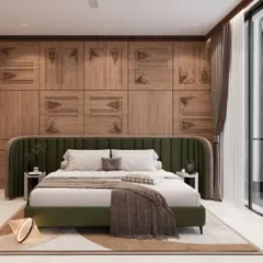 This luxurious bedroom design features intricately carved wooden paneling behind a lush green upholstered bed. The combination of natural textures and modern furniture creates a sanctuary of comfort and style.