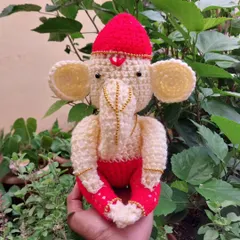My handmade crochet Ganesha doll, perfect for your car dashboard, desk, or as a thoughtful gift. I've carefully added small details like the golden jewelry to make this amigurumi extra special.