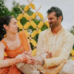 Laughter and splashes during Eli and Suman's Haldi. I am not afraid to get close to the action to capture the genuine fun of the moment.