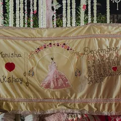 Your love story is unique, and your wedding rituals should be too. I hand-embroider these beautiful antarpats with your names, wedding date, and even a custom illustration of the bride, turning a sacred tradition into a personal heirloom.