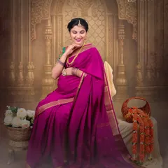 We celebrate tradition with our fine-art studio sessions. This portrait features a mother-to-be in a gorgeous magenta silk saree, seated gracefully against a regal, palace-themed backdrop, creating a timeless and culturally rich image.