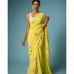For e-commerce brands, a clean, vibrant, and perfectly lit image is everything. Here, I've used a solid color background to make this beautiful yellow hand-painted saree pop, highlighting the intricate details and true-to-life colors for online shoppers.