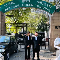 With a colleague at the National Green Tribunal in Delhi. My practice also includes environmental law, where we work to be part of the solution, not the pollution.