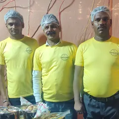 Our team of professional staff, all in uniform with our "Rafiq Bhai Caterers" logo. They are trained to be polite and serve your guests efficiently.