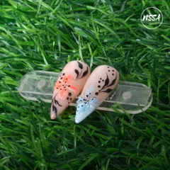 This design features the popular Korean glass effect with 2D flowers. The translucent, layered look of the petals gives a delicate and elegant finish, perfect for a sophisticated style.