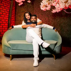 A fun and happy portrait of the couple on a sofa. Capturing these genuine smiles and playful interactions is what I love about my job.