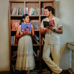 For the couple whose love story started with books. Suchita and Om Prakash share a moment in a cozy library setting, a unique and personal pre-wedding theme.