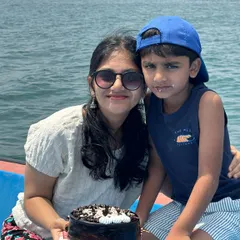 A mother and son celebrating with a cake during their private boat ride. We can accommodate celebrations for the whole family out on the water.