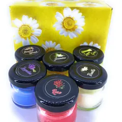 This image shows the scented jar candles with their gift box packaging. This set of six assorted fragrances makes for a wonderful and thoughtful gift for any occasion.