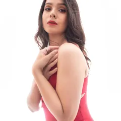Another angle of the red-carpet look, showing how the makeup enhances her features and creates a beautiful, polished appearance.