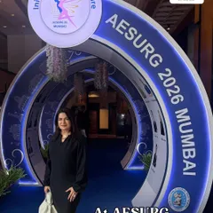 At the entrance of the AESURG 2026 conference. These events are crucial for discussing complex topics like periorbital rejuvenation and ensuring the highest standards of safety and efficacy in treating the delicate under-eye area.