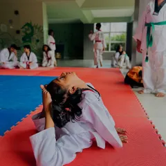 Another young student mastering a difficult flexibility pose. This level of control is essential for advanced Taekwondo movements.