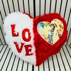 A soft and cuddly way to show your love. This heart-shaped cushion can be personalized with your favorite photo, making it a sweet gift for Valentine's Day or an anniversary.