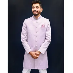 Pastels are in, and this lavender Indo-western is a crowd favorite. The subtle self-design on the fabric and the clean, tailored fit make it a majestic yet minimal choice for any wedding function, from the engagement to the main event.