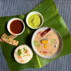 A delightful combo from our Shravan menu: Jeera Kaju Varai Pulao and Singdana Amti. This dish offers a perfect balance of flavors and textures for a satisfying fast.