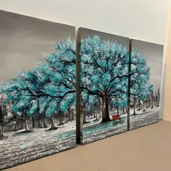 An angled view of the canvas art, showing the texture of the paint.