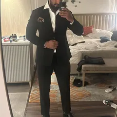 Suited up and ready for a wedding reception in Jaipur. I always coordinate my attire with the event's dress code to maintain a professional and polished look.