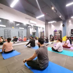 A quiet moment in our group yoga session. We focus on the breath and the present moment, creating a space to let go of the day's stress and tune into our bodies.