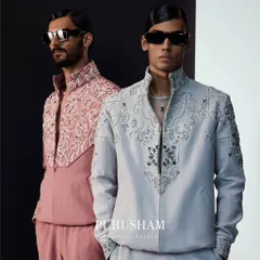 This image showcases two key looks from my Summer '24 edit. On the left, a blush pink bomber set, and on the right, a light grey version. Both feature my signature embroidery and are crafted from breathable fabrics for summer adventures.