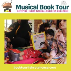 What is he reading so intently? A young Shrota completely absorbed in our 'Color & Learn with Little Bajo' book during a musical book tour event.