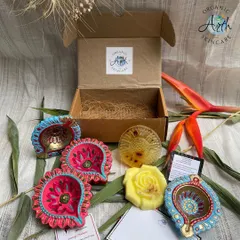 My sustainable Diwali hamper is a perfect example of conscious gifting. This box features my best-selling handmade soaps alongside beautiful, hand-painted diyas sourced from a local NGO. It's a gift that truly gives back to the community.