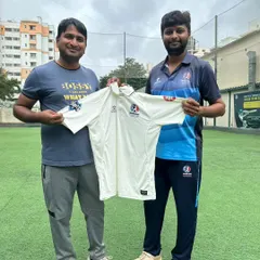 A player receives his official team jersey. Being part of a team and wearing its colors is a proud moment for every cricketer.