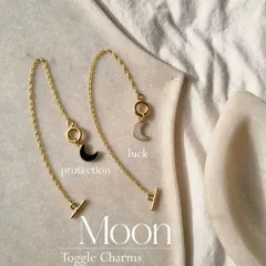 Tell me your birth month. Wearing your birthstone can help with luck and manifestation. This image shows my Moon toggle charms in Black Onyx for protection and White Moonstone for luck.