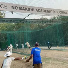 A glimpse into a net session at our Ramjas Sports Complex facility. Here, one of our ICC certified coaches provides direct, hands-on instruction to a young batsman. We focus on getting the fundamentals right, from grip and stance to shot selection.