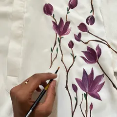 Why are hand-painted clothes so special? Each piece is one of a kind and offers limitless customization. It's a way to support artists and own something truly unique that tells your story.