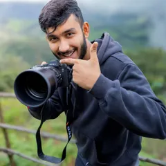 In my element with my camera. The goal is to not just take photos, but to create art.
